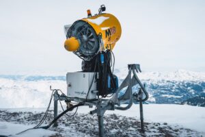 A telescope on top of a snowy mountain