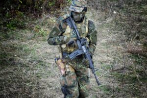 soldier holding rifle